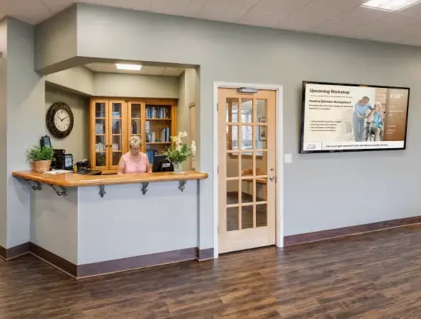 Senior facility center lobby area with digtial signage