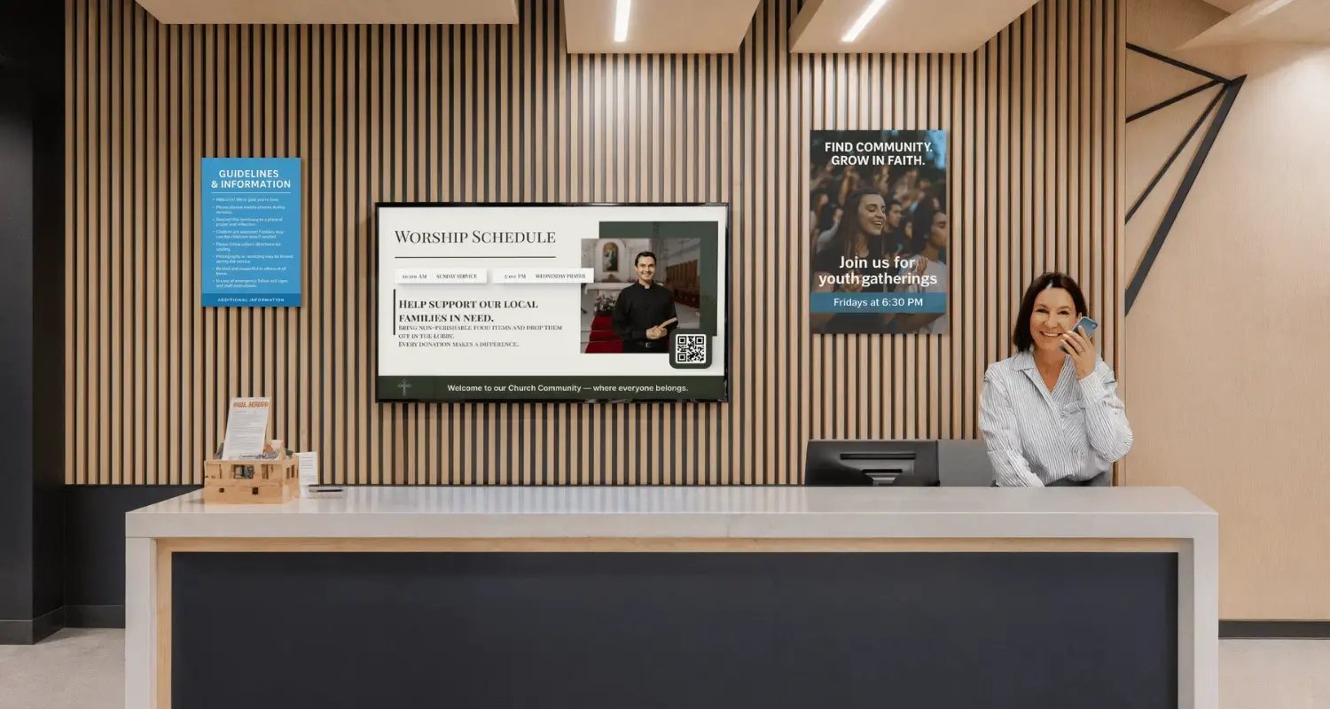 The lobby of a religious worship facility witha  woman smiling and accepting new patrions
