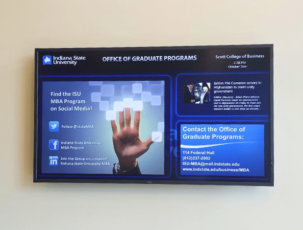 A large Rise Vision display TV showing the office graduation program