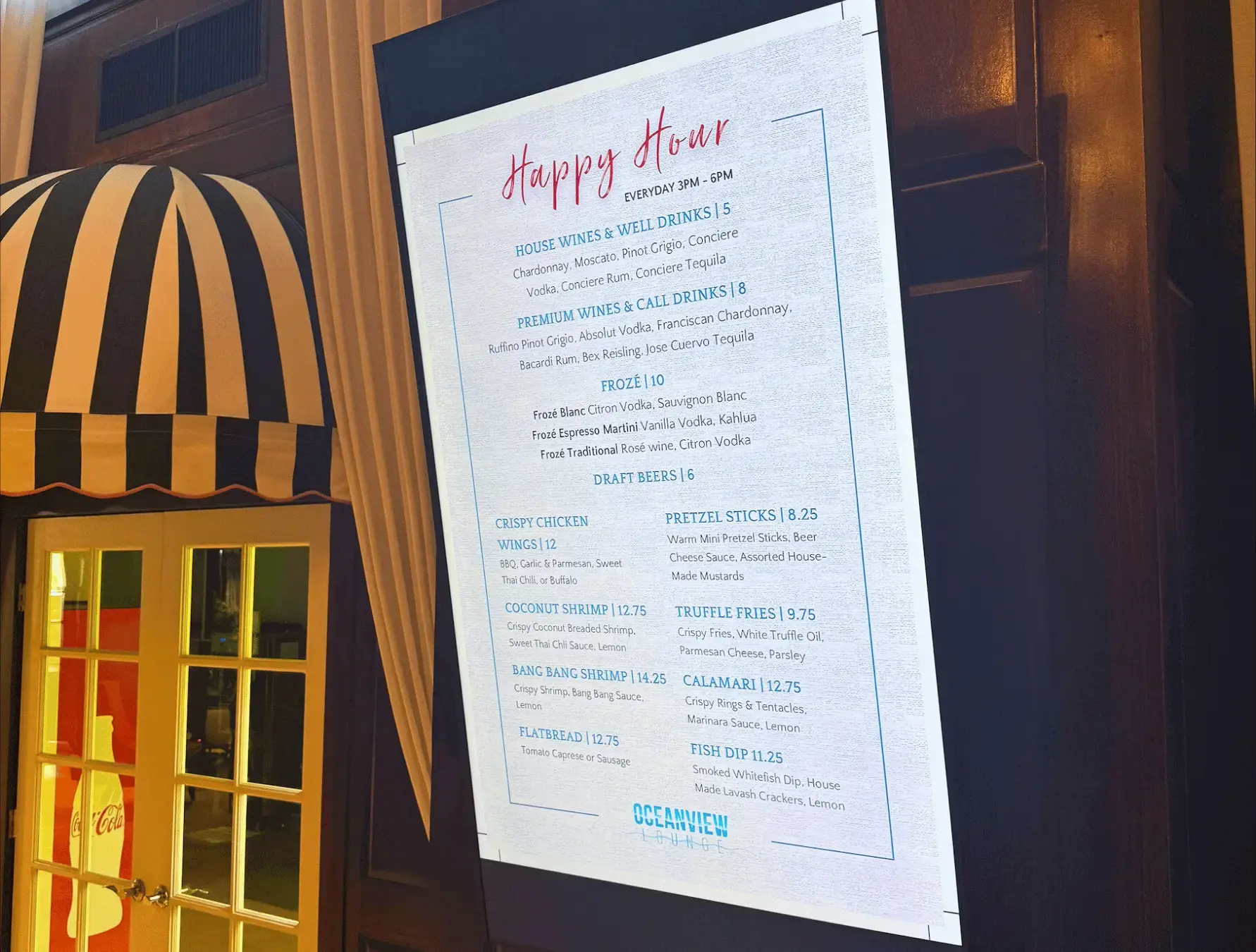 Digital signage display with happy hour menu