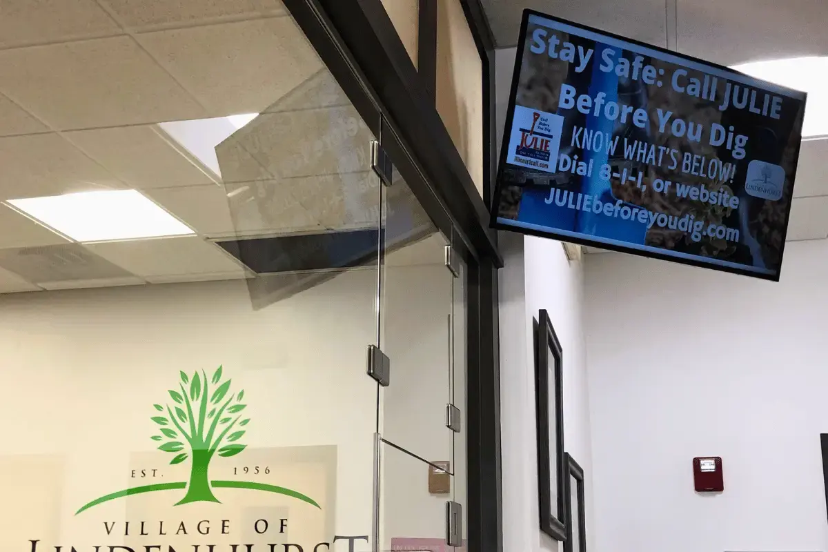 Public safety digital signage on a wall of a government office