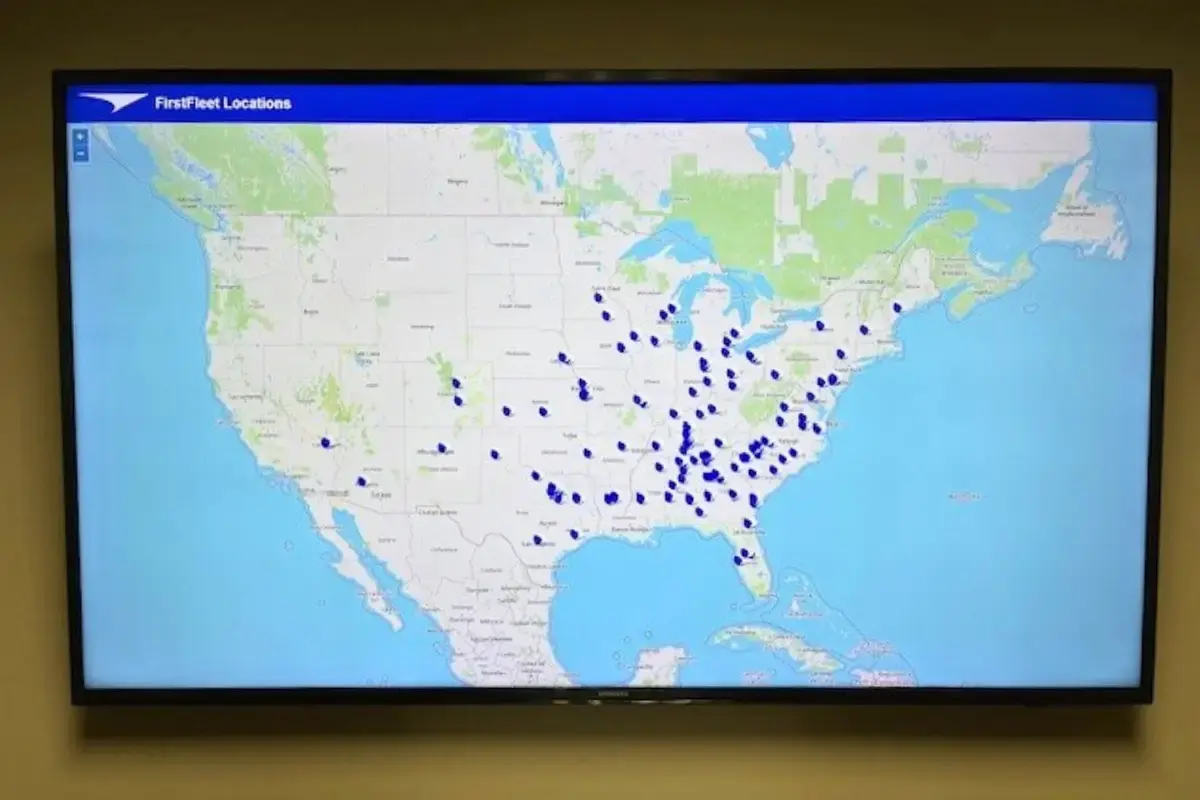 Digital signage display showing plots on a US map