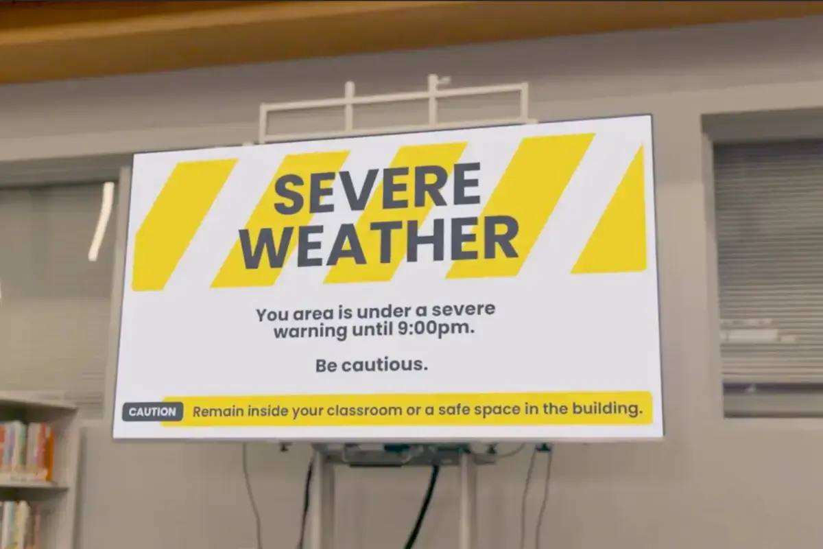 Digital signage display indicating severe weather conditions