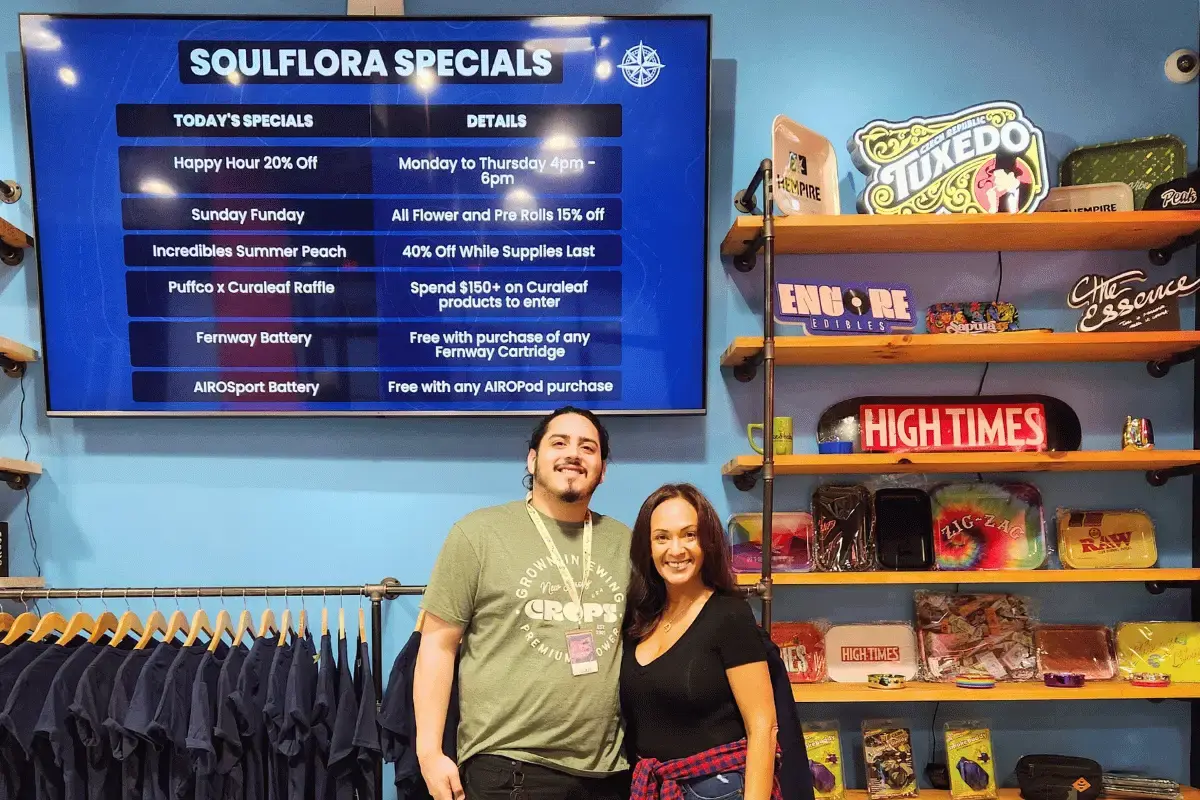 A retail store with a digtial display promoting upselling campaigns